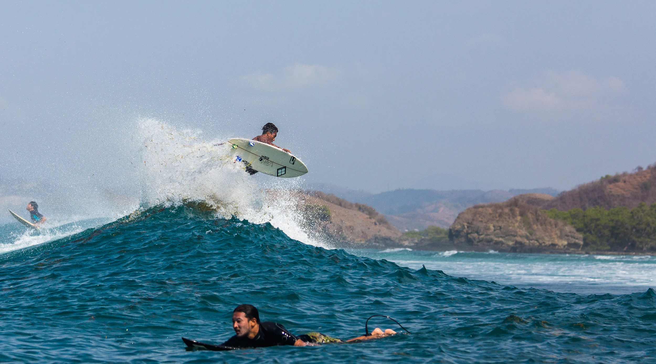 Local finding space in-between the crowds to punt an air reverse.