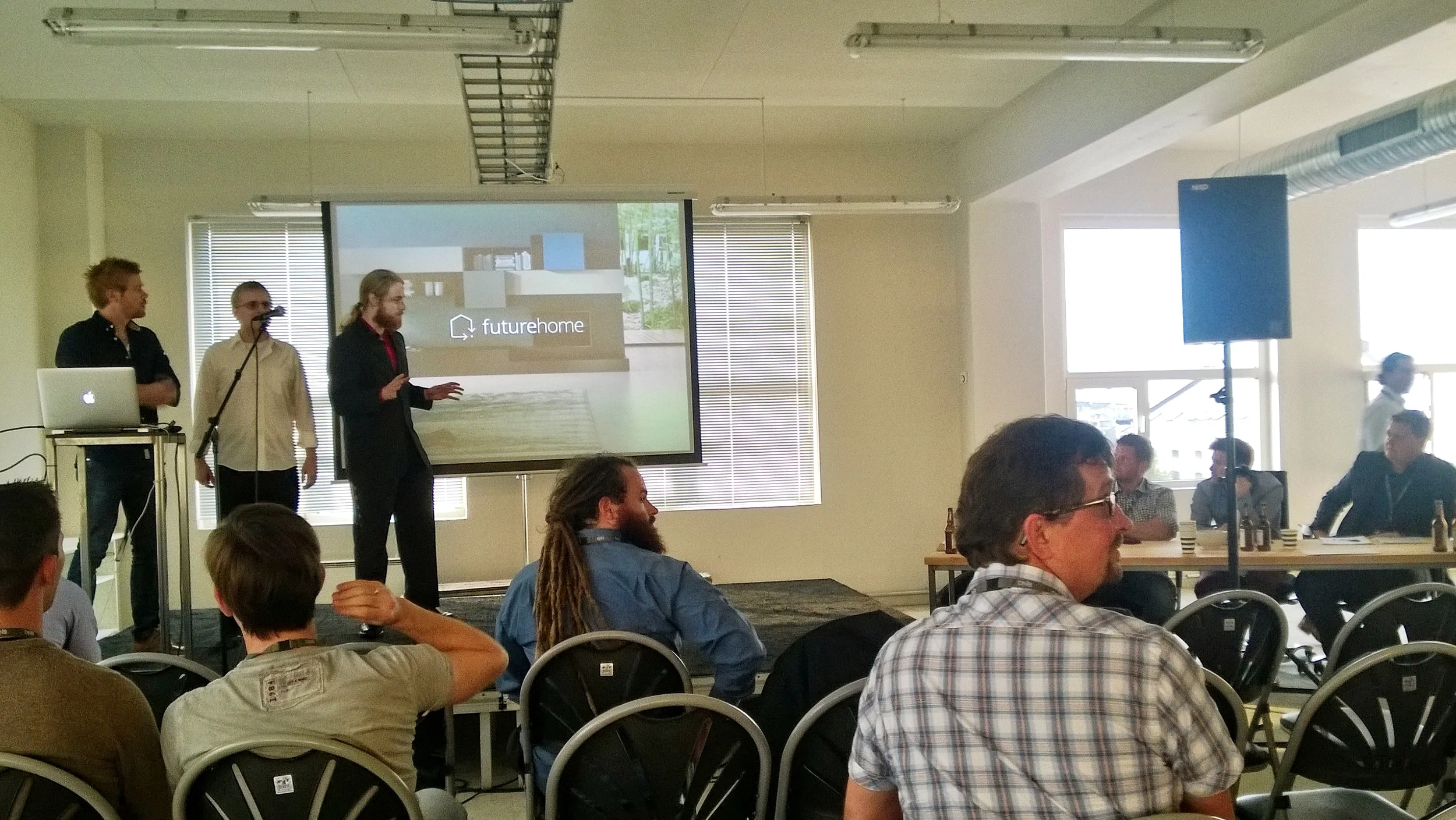 Espen Christensen at the right of the jury table during the winning presentation from Future Home.