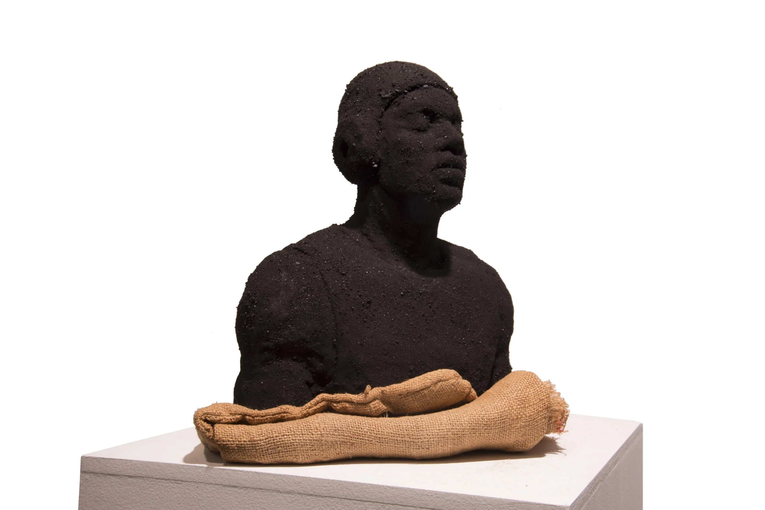 Folding, 2014, Derek Fordjour. Coal, iron, clay and burlap. Image courtesy of Derek Fordjour.