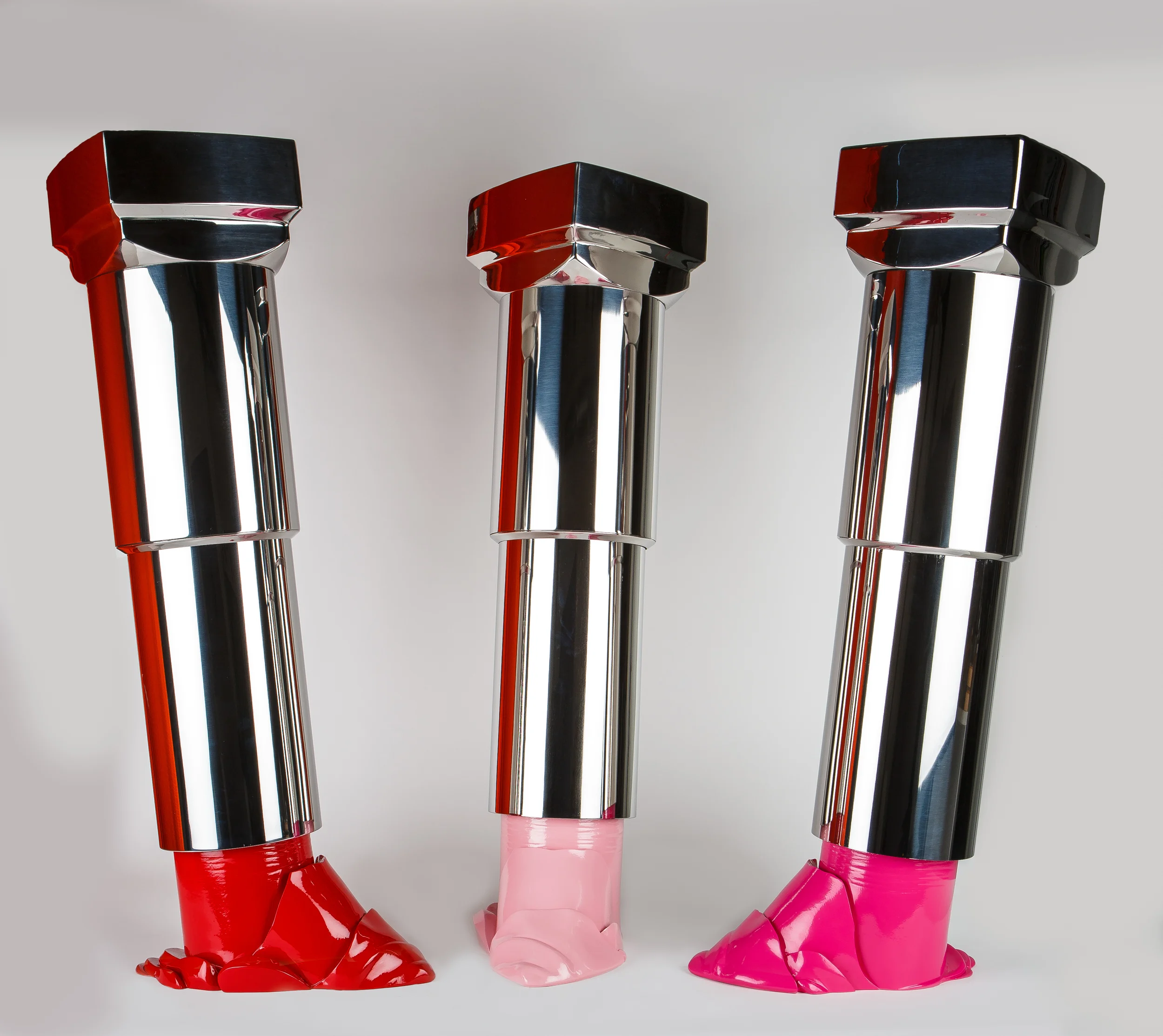 Fuck the System, 2015, Siren Red, Frosted Pink, Hot Pink, 39 x 15 x 12 in each, edition 3 of 5.