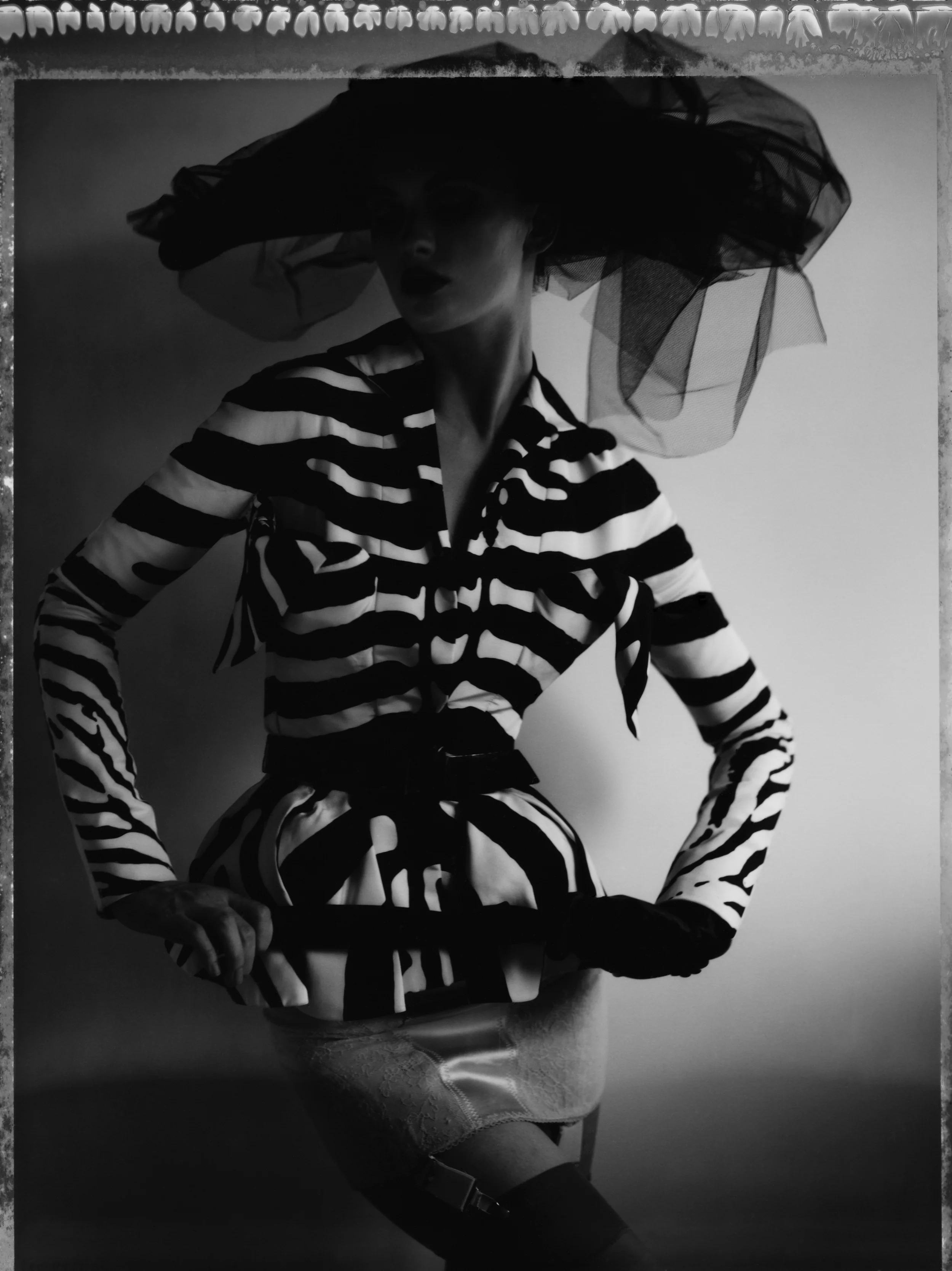 LA PARISIENNE III, DIOR - HAUTE COUTURE WINTER 2009 - N°10, 2010. Gelatin silver print, 24 x 20 inches (61 x 50.8 cm). © Cathleen Naundorf / Courtesy Edwynn Houk Gallery, New York & Zürich