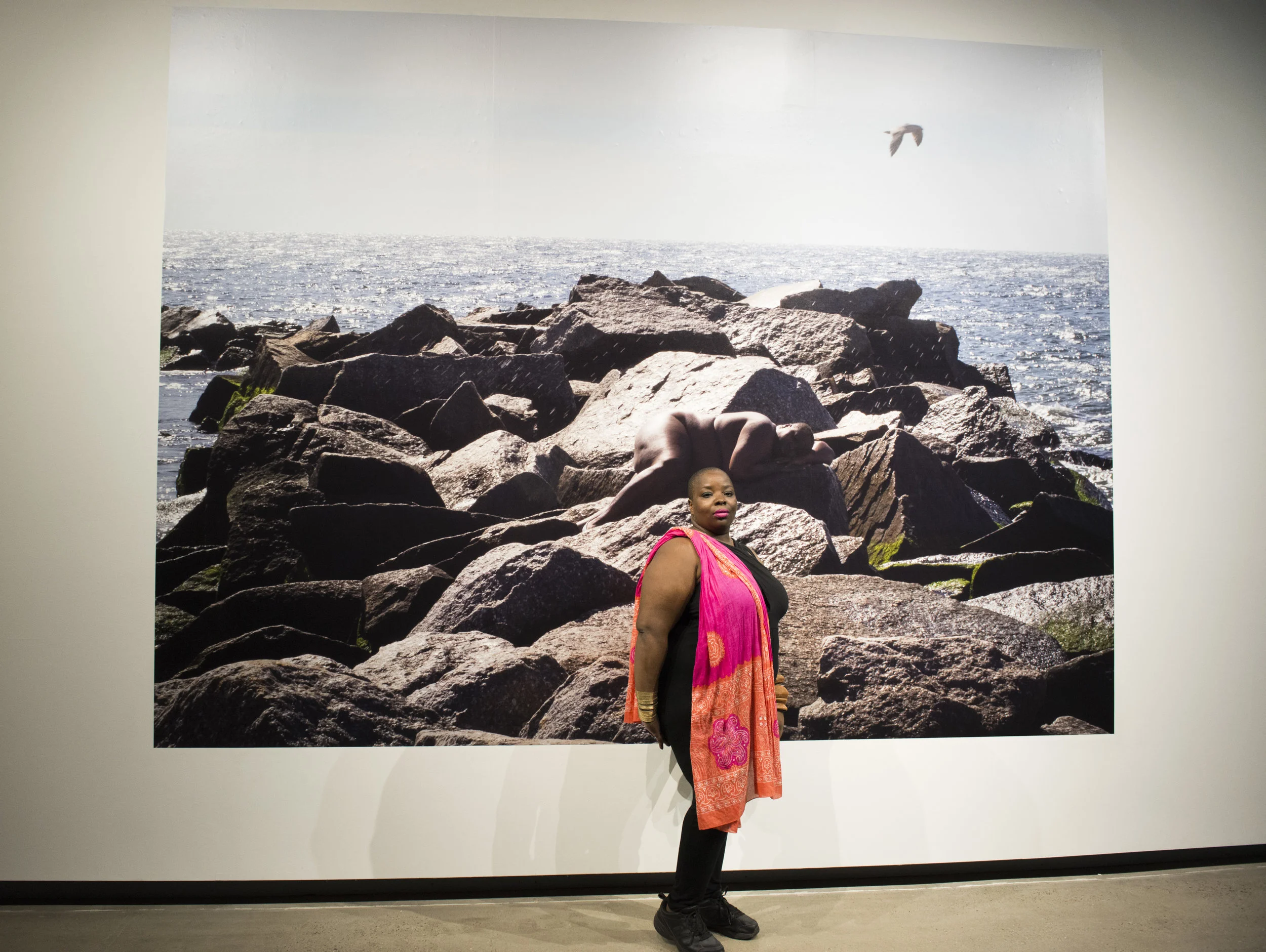 Nona Faustine in front of her work 'She Came to Me One Day' (2012) Photo: Kearra Amaya Gopee