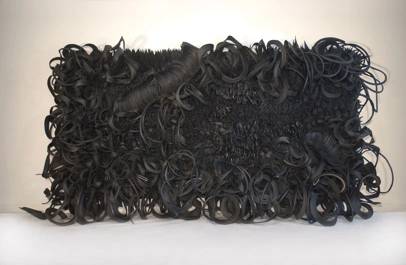 Chakaia Booker, Acid Rain , 2001; Rubber and wood, 120 x 240 x 36 in. ; Museum purchase: Members’ Acquisition Fund