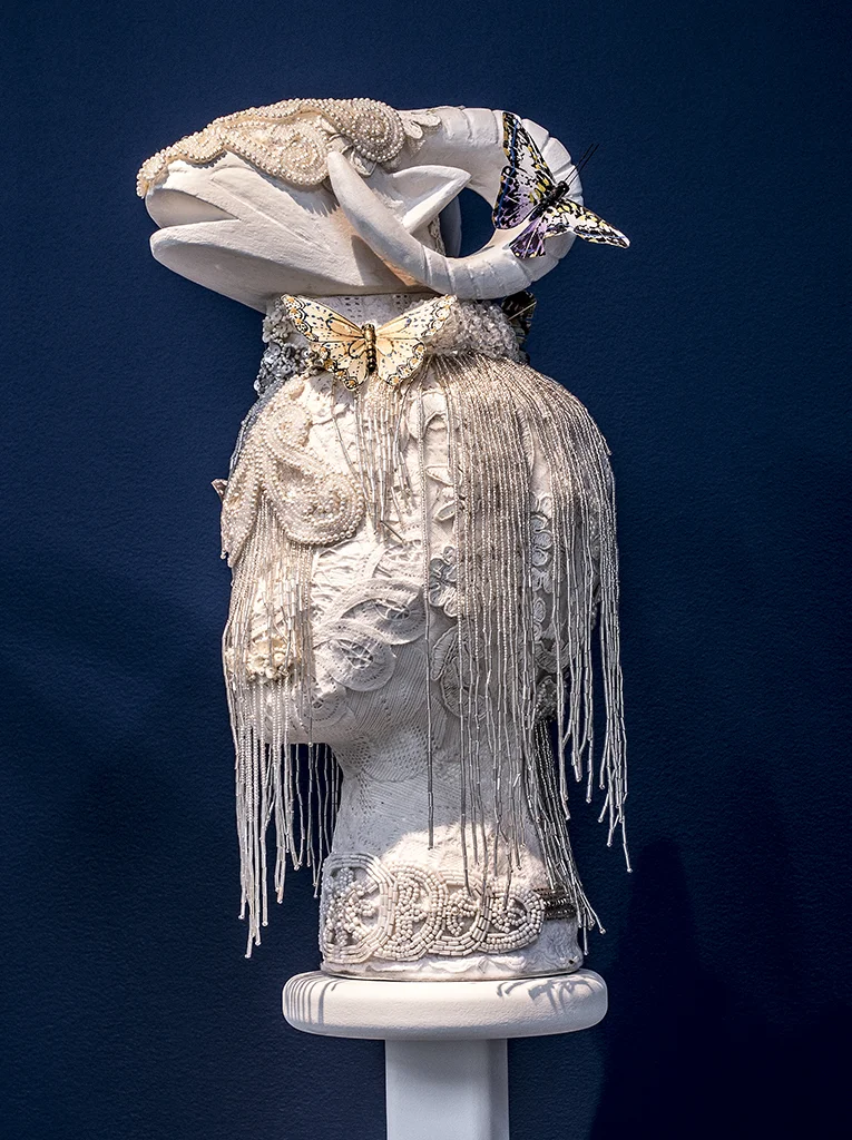 Saya Woolfalk, White Shed (Ram) , 2016, Mixed media, Sculpture: 17 x 10 x 6-1/2 inches, Stand: 48 x 12 x 12 inches. Copyright Saya Woolfalk, courtesy Leslie Tonkonow Artworks + Projects, New York