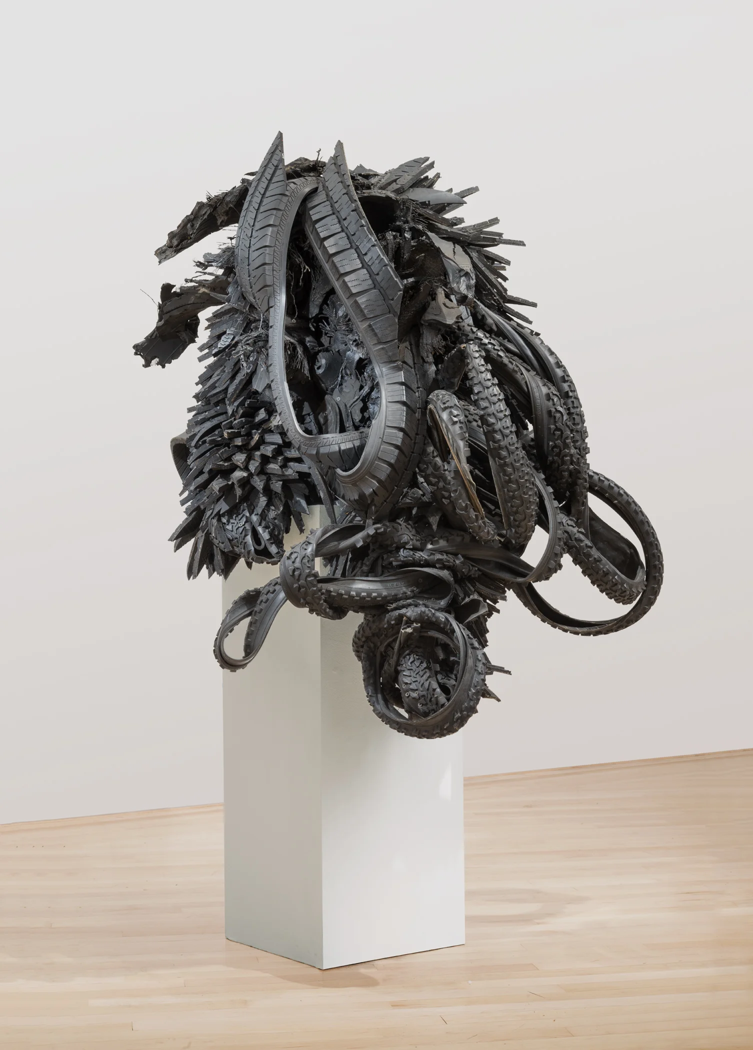 Chakaia Booker, El Gato, 2001. Rubber tire and wood, 48 x 42 x 42 in. Photo by E. G. Schempf. Collection of the Kemper Museum of Contemporary Art, Bebe and Crosby Kemper Collection, Museum purchase, Enid and Crosby Kemper and William T. Kemper Acquisition Fund, 2004.12; © Chakaia Booker