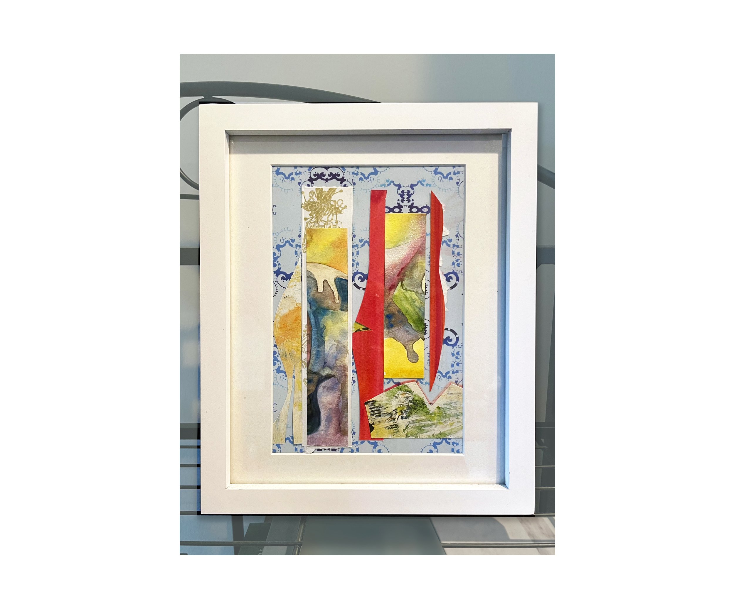 Sevens, mixed media collage, in white frame, by Ceil Diskin
