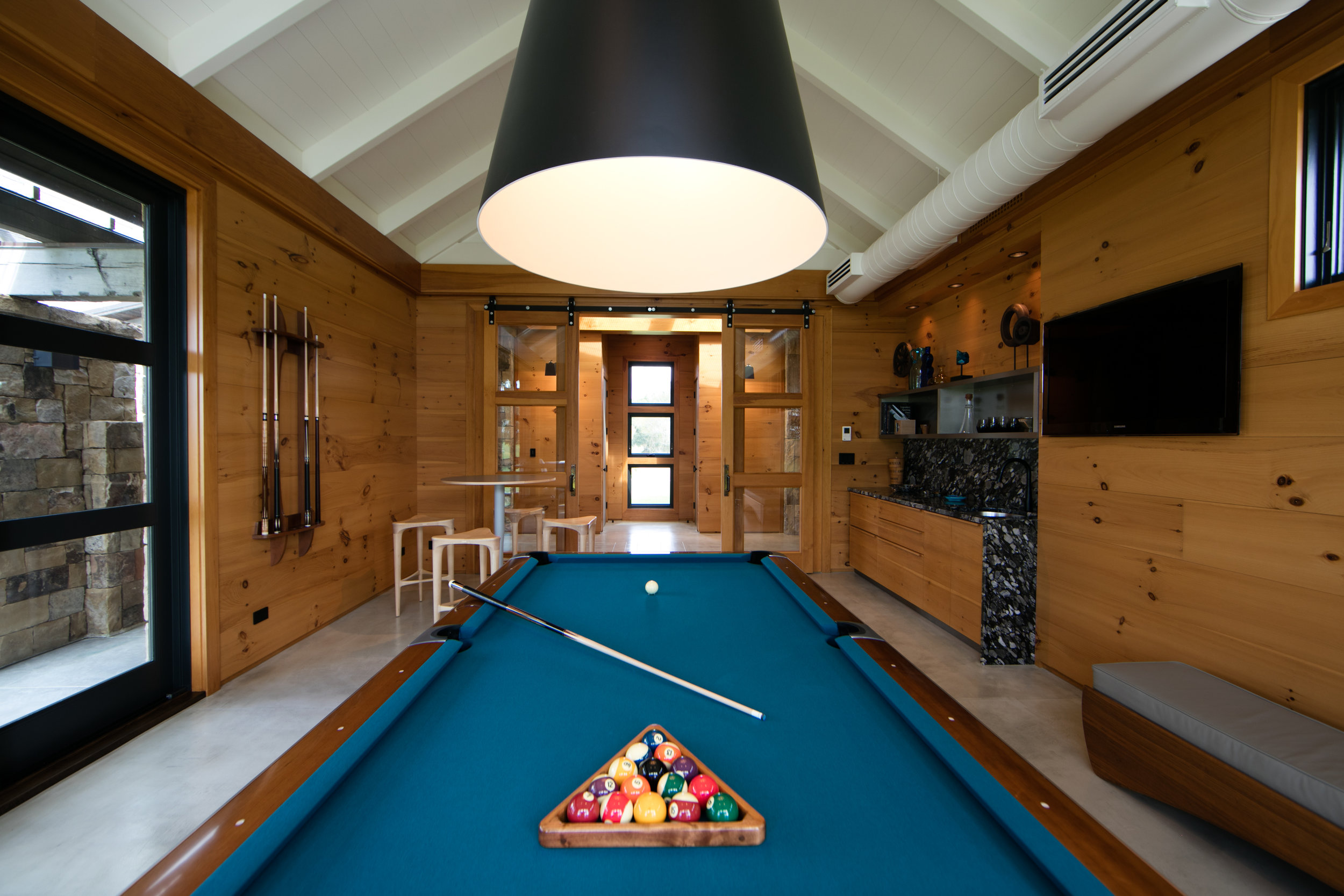 Pool table in farmhouse game room