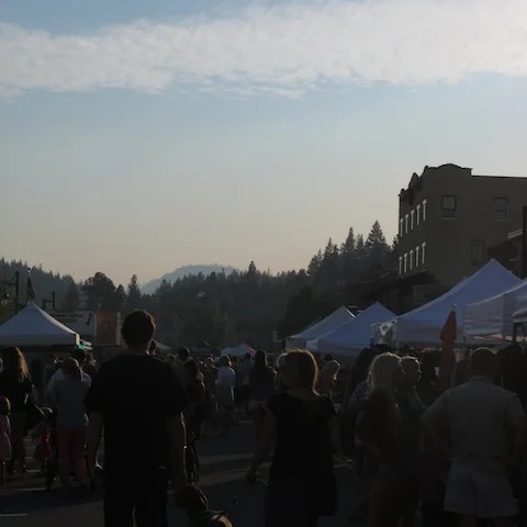 Truckee Thursday visitors stroll through a hazy August evening.