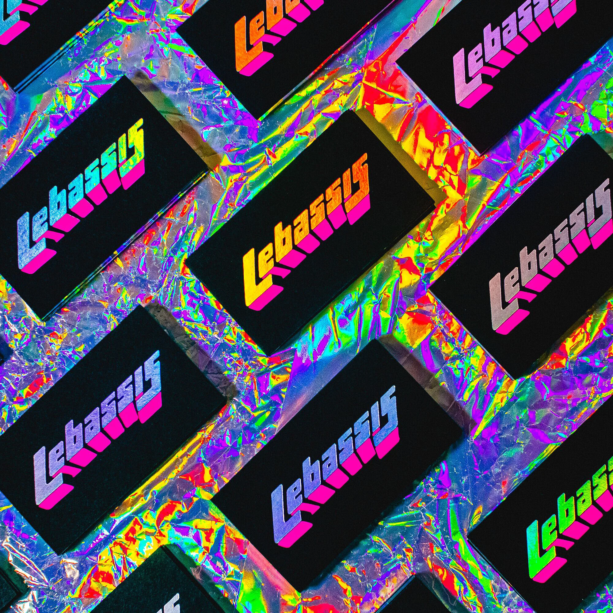Business cards designed by Lebassis Holographic + Neon Pink foil stamping on Sable Black Senses paper. Photo by Lebassis 🙌👌✨🌈 Printed by Dot Studio, London #businesscards #iridescentfoil #holographicprinting #holographic #printedbydotstudio #foilprint #foilstamping #printedbydotstudio #dotstudio