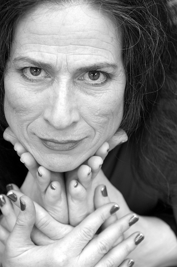 Anna Forrest . Yoga instructor. Yes, those are her feet under her chin. Now you try.