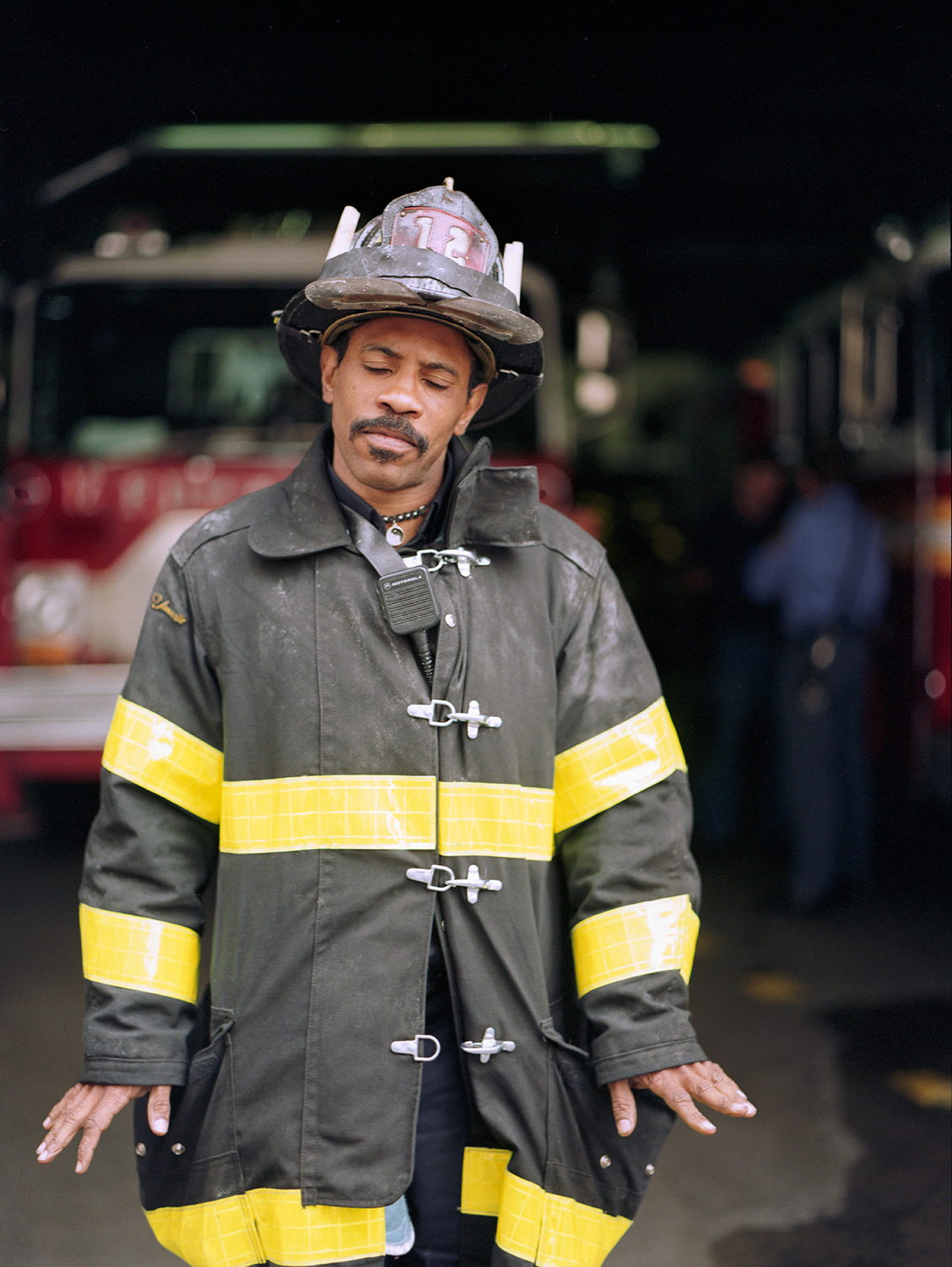  Unnamed firefighter, NYFD Ladder Company. If you had the contact sheet, you’d see he’s all teeth, gusto, and bravura in the frames before and after this one.&nbsp; But the thing is, sometimes, in spite of ourselves, the photo machine captures these 