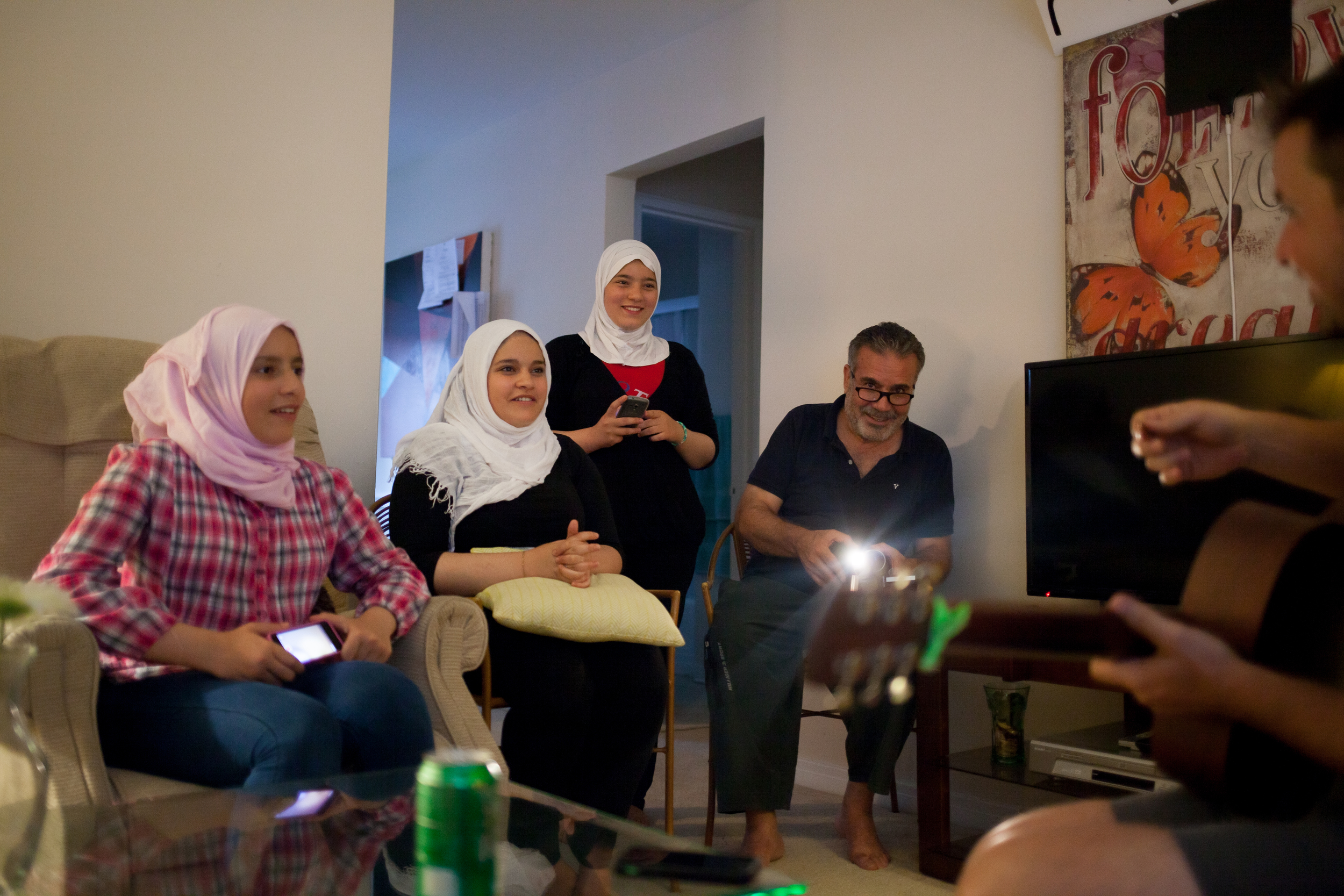  The Al Suhkita Family fled as political refugees from Damascus, Syria to Winston-Salem, NC. The family is pictured with a volunteer from Awake Church in Winston-Salem that helped the family begin again in a new country. 