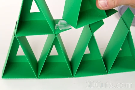 Paper Advent Calendar designed by Marji Roy of 3dcuts.com. Cutting files in SVG, PDF, and DXF formats available for cutting on Silhouette or Cricut. Complete tutorial included.