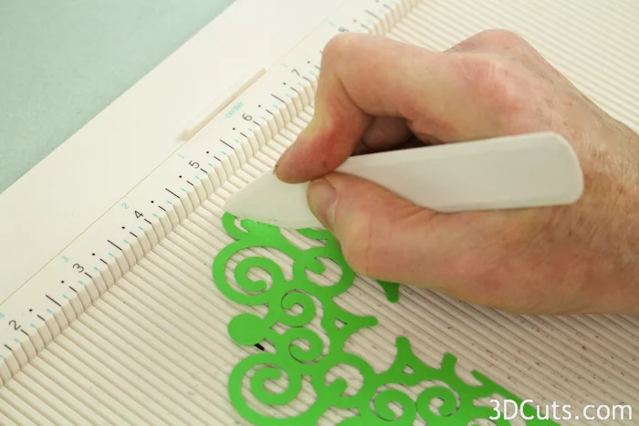 Use a scoring board to score along dotted lines if shapes cut smaller.