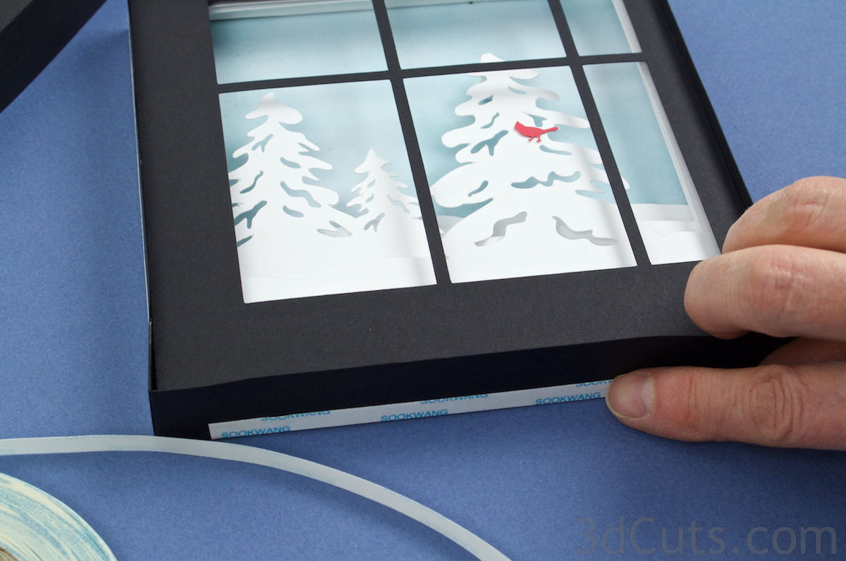 1. Apply Scor-Tape along the back edge of each side of frame 5. Place it in the middle leaving the corners without. Leave backing in place.