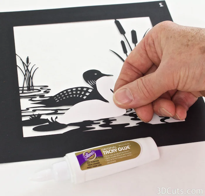 Loon Lake Shadow box Tutorial by Marji Roy of 3dcuts.co m. Cutting files in svg, pdf, and dxf formats for paper cutting using Silhouette and Cricut cutting machines
