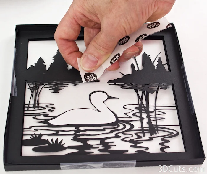 Loon Lake Shadow box Tutorial by Marji Roy of 3dcuts.co m. Cutting files in svg, pdf, and dxf formats for paper cutting using Silhouette and Cricut cutting machines