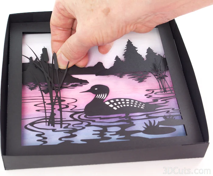 Loon Lake Shadow box Tutorial by Marji Roy of 3dcuts.co m. Cutting files in svg, pdf, and dxf formats for paper cutting using Silhouette and Cricut cutting machines