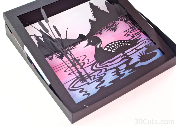 Loon Lake Shadow box Tutorial by Marji Roy of 3dcuts.co m. Cutting files in svg, pdf, and dxf formats for paper cutting using Silhouette and Cricut cutting machines