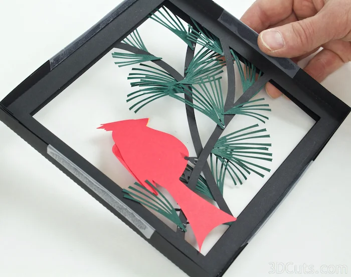 Cardinal in Pines Shadow box by Marji Roy of 3dcuts.com. This is a cutting file for use on Cricut and Silhouette cutting machine. It is made from card stock. Files available in svg, pdf, png and pdf formats.