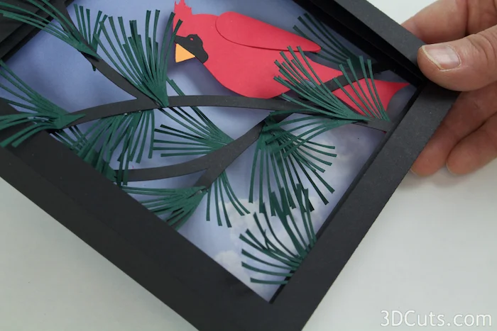 Cardinal in Pines Shadow box by Marji Roy of 3dcuts.com. This is a cutting file for use on Cricut and Silhouette cutting machine. It is made from card stock. Files available in svg, pdf, png and pdf formats.
