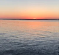 Sunrise over water 200.jpg