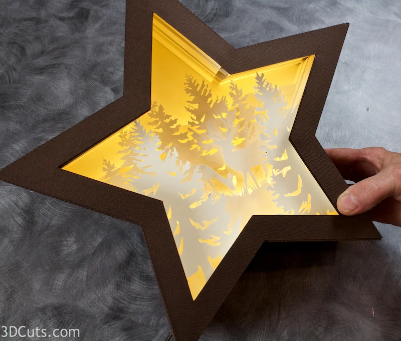 Illuminated Shadow Box made from card stock. SVG,PDF,DXF, PNG cutting files available from 3dcuts.com
