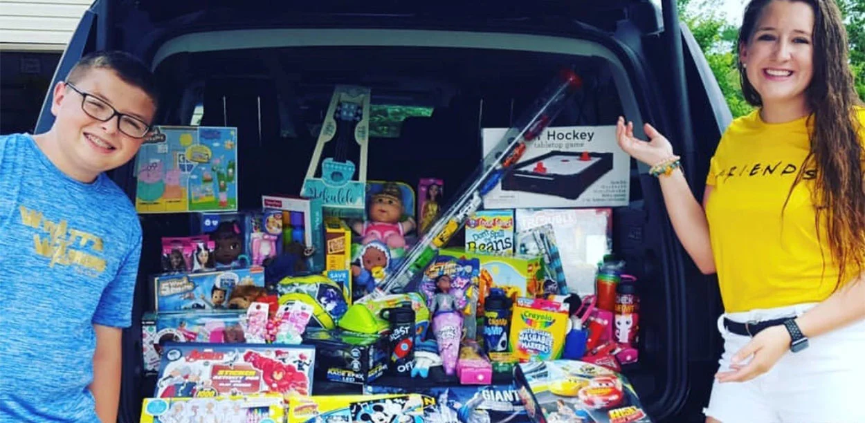 2018 Rogers Scholar Kennedy Bruner of Garrard County collects toy donations for the Wyatt’s Warriors Toy Chests at the University of Kentucky Children’s Hospital for her community service project. The toys were donated at an end-of-the-school-year celebration planned and organized by the Garrard County High School student.