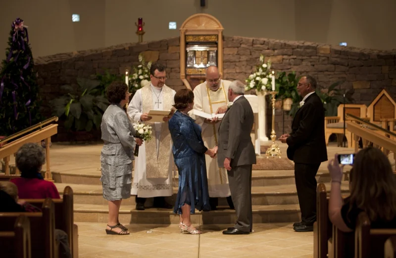 Something I didn't know until this wedding was that as a photographer, you have to stand behind the last pew of guests no matter how full the church is...which also gave me a new appreciation for my 70-200mm 2.8!