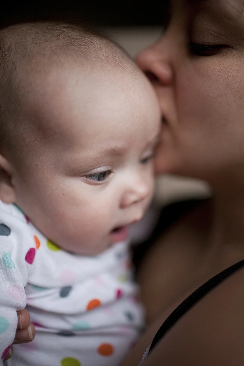 Soo sweet! There is nothing better than the look of a mother's love....photo gold!
