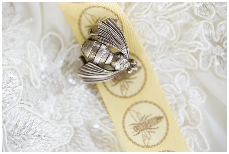 Her bee pin for her bouquet, very cute!