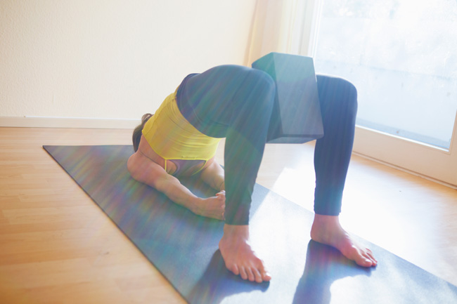Yoga block with bridge pose.