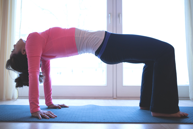 Try the bridge yoga pose to improve your posture