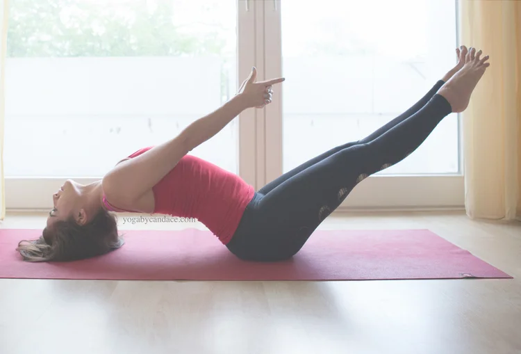 Fish pose Wearing: teeki moon pants , f21 tank . Using: manduka travel mat .