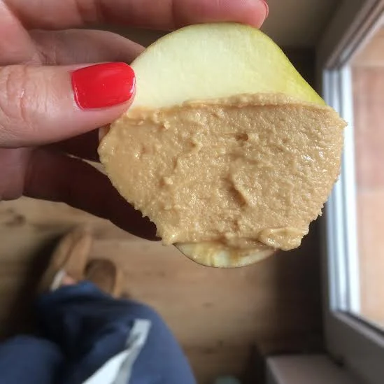 Little apple & peanut butter snack. Nothing beats homemade peanut butter - this is made the same way as almond butter. Wearing: Favorite ugg slippers , Lululemon sweatpants.