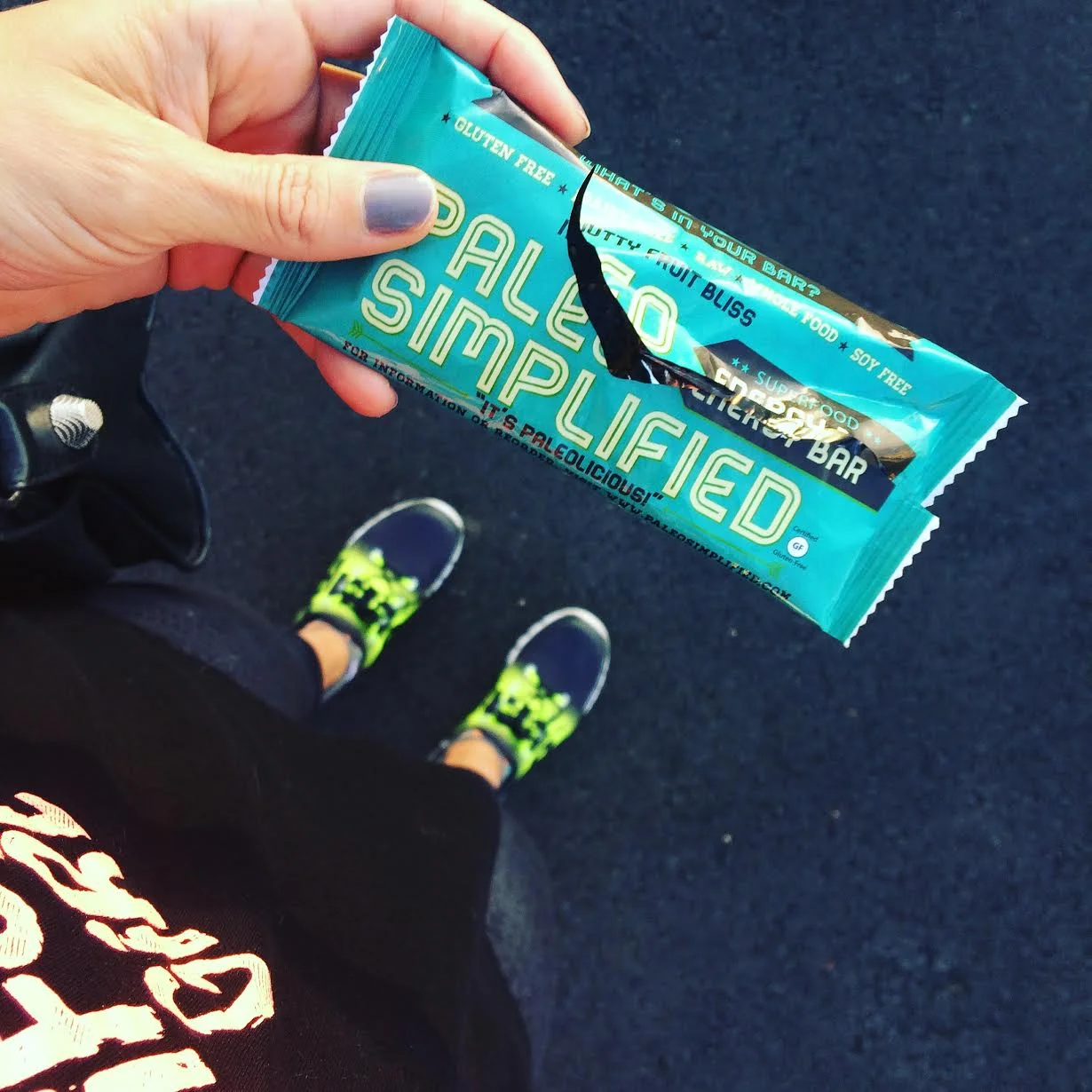 Off to the gym Wearing: reebok sneakers , sweaty betty capris . Eating: Paleo Simplified bar .