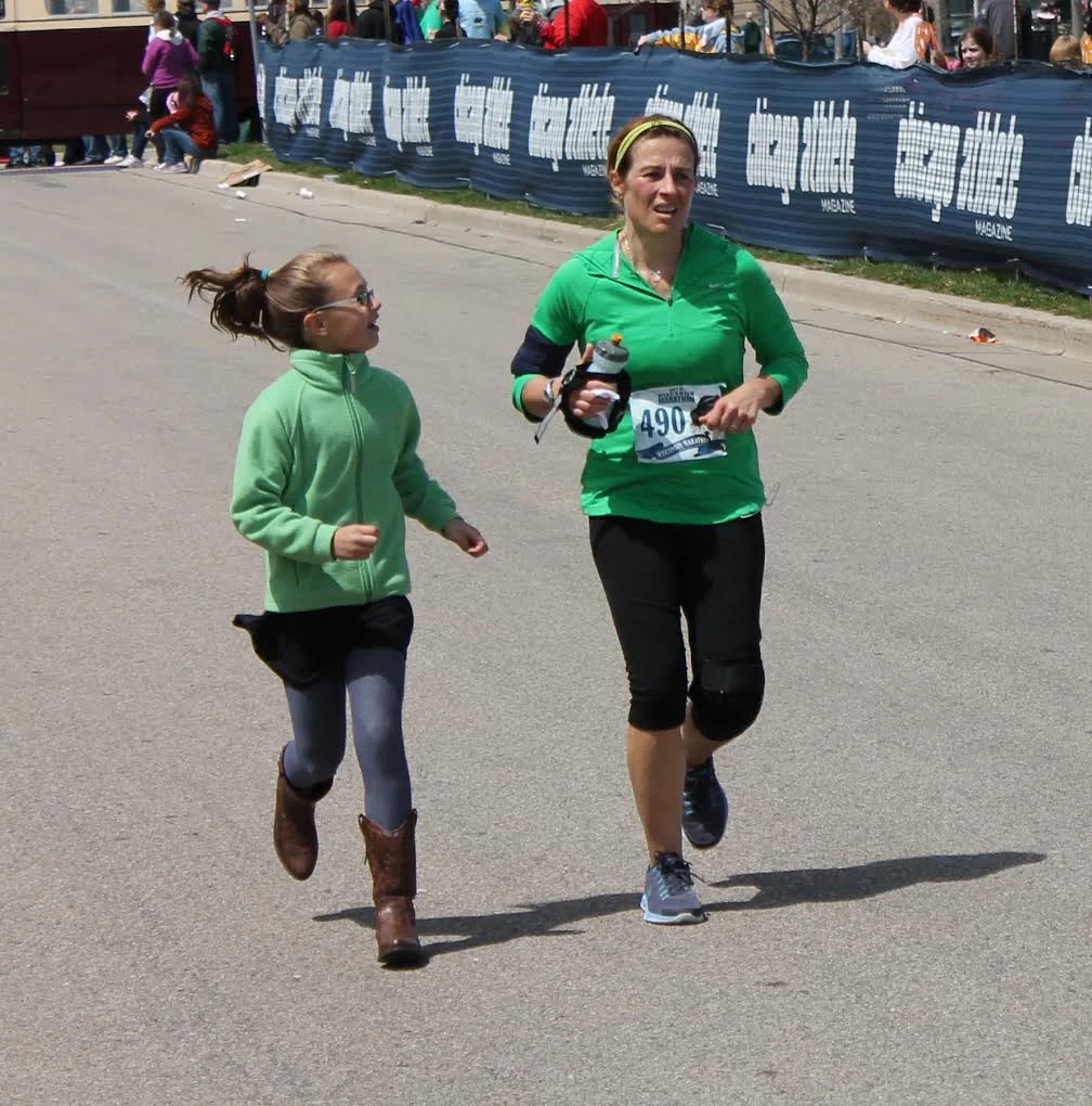 Showcase your strengths - Wisconsin Marathon nearing the finish line.....invited my daughter to jump in and join me as a sort of "Girl Power" moment.