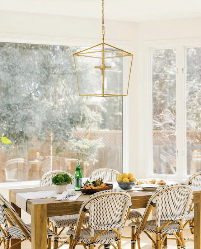 Those bistro chairs, that light fixture, and the stunning windows?! Come on. Havenly has some gorgeous designs.