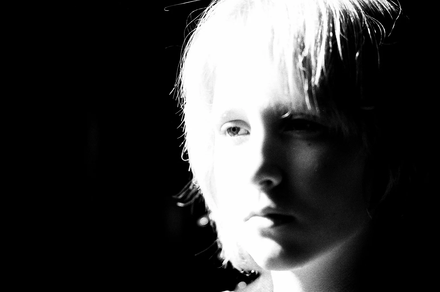 Original shot with a Canon AE-1 and Ilford 400 Delta black and white film.