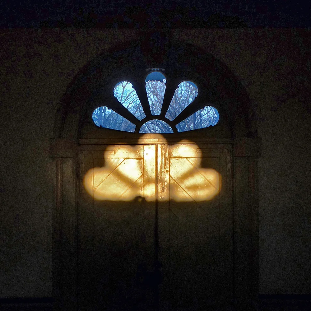 Fanlight and reflection in entry hall