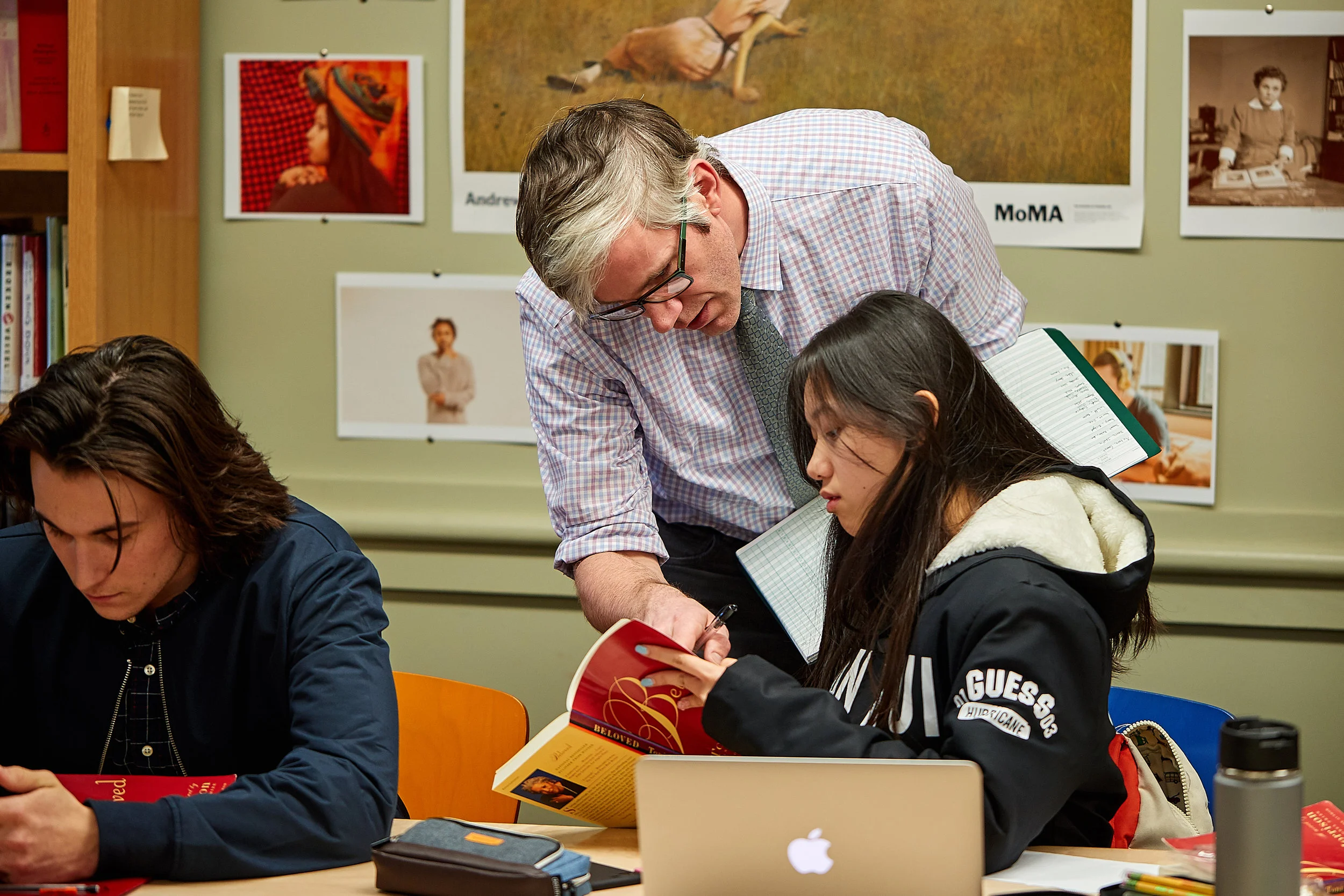 Jon Phinney working with 11th grade English students.