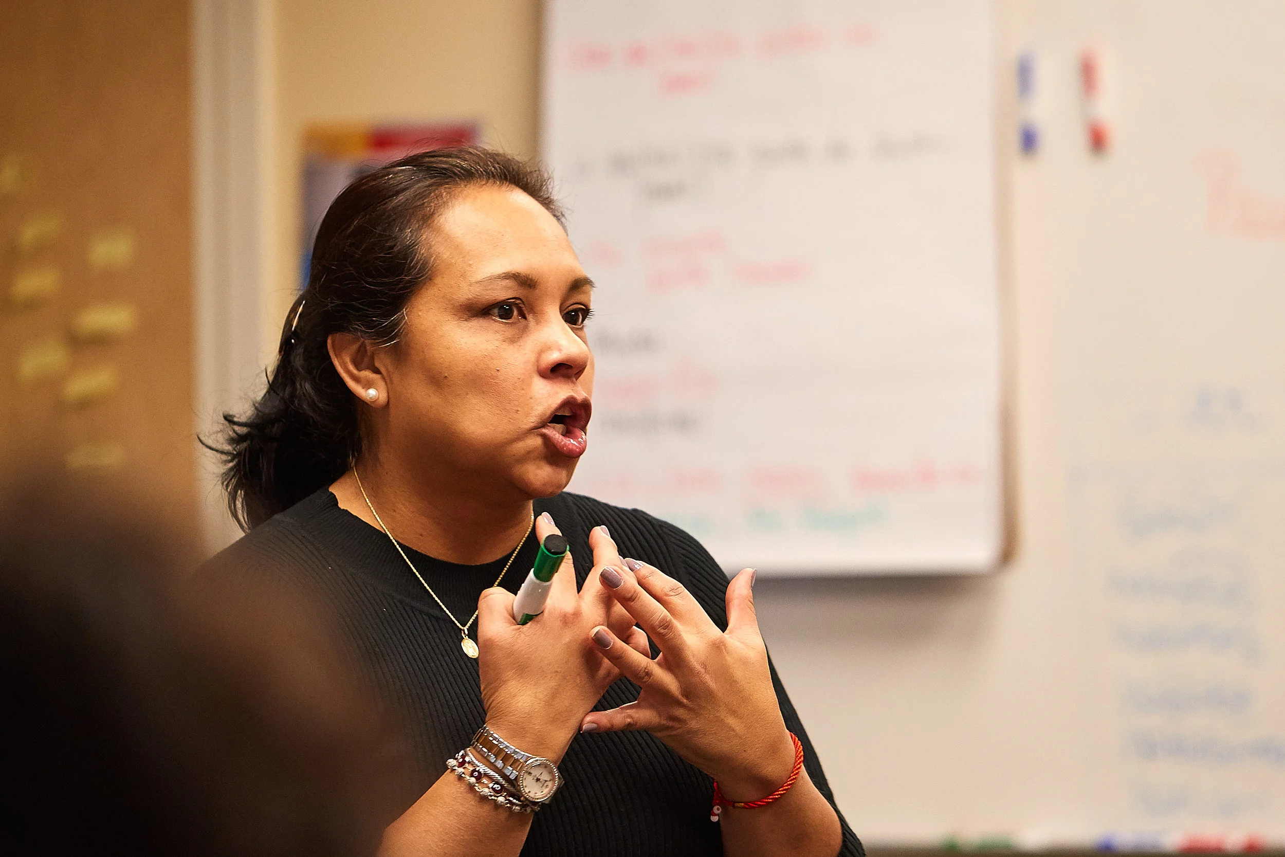 Bernarda Del Villar making a point to Spanish III students.