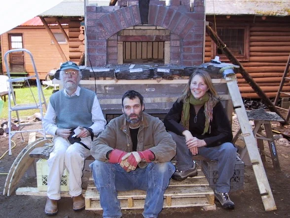 Alan Scott, Greg, Julie (assistant to Alan)