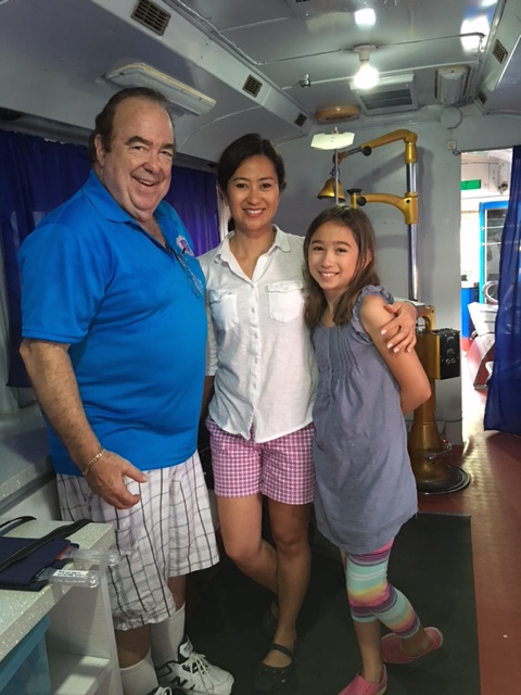 Dr. James Weyrich, Dr. Lyndi Schmidt, and Dr. Schmidt's daughter Nina on their first day of the EyeCare WeCare Mission in the Philippines.