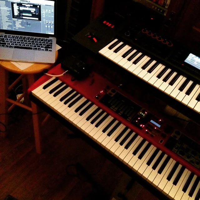 My keyboard rig is actually very similar to the one described above. I usually run a Nord Stage, 2nd tier midi controller, and a laptop running Mainstage at most shows. 