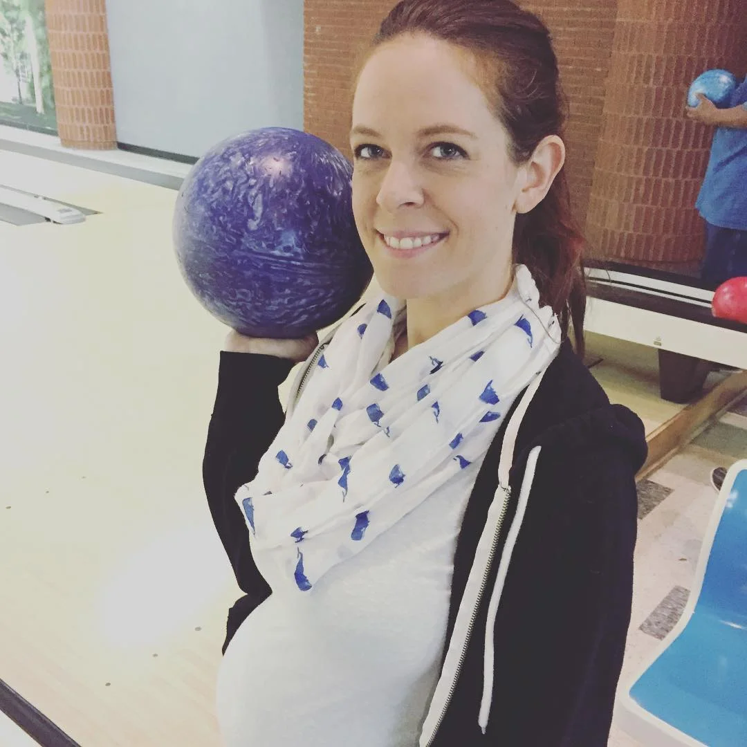 My beautiful wife Sarah, pregnant and still kicking my butt at bowling.