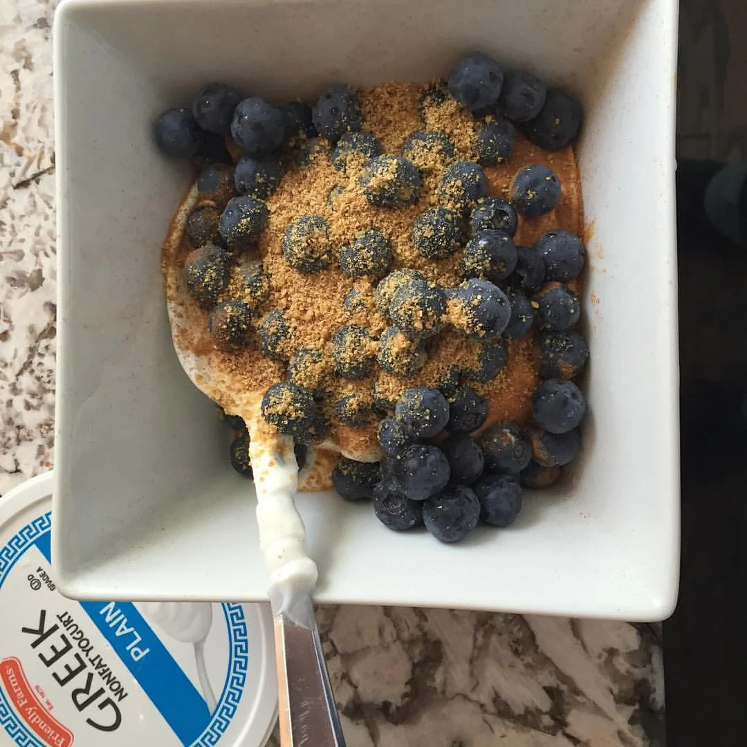 I've been eating a lot of organic greek yogurt and fresh blueberries, topped with flax seeds. It's fast, easy, and I can eat it one handed while holding a baby. 