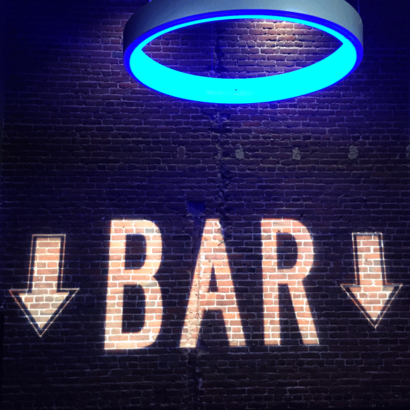 This has nothing to do with the event but it was in the venue and I loved the use of light for the sign.