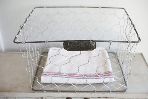 vintage wire basket perfect for linens and towels.jpg