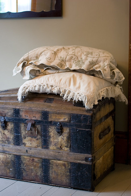 antique trunk with pillows.jpg